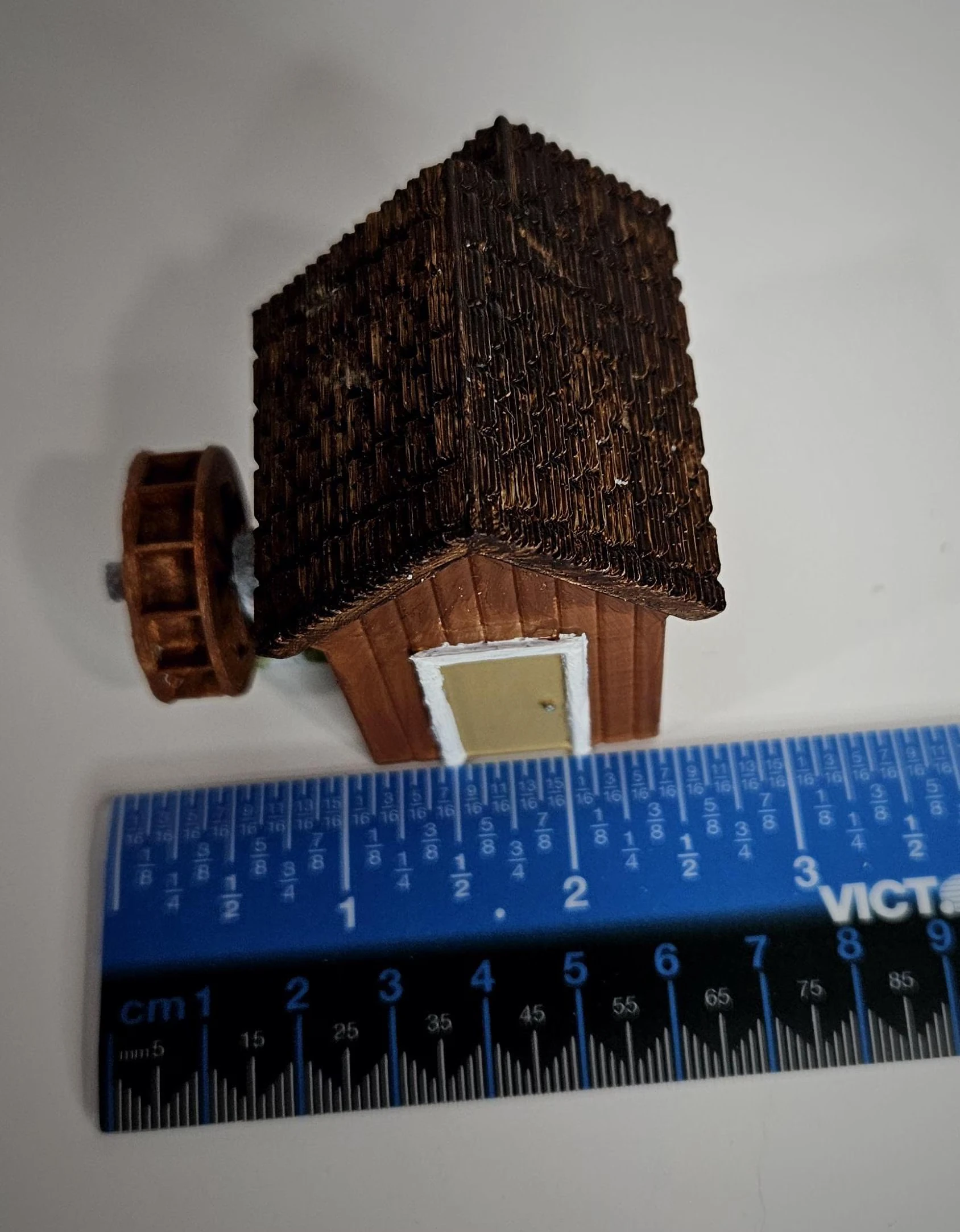 Additional display view of HO scale waterwheel with medium building